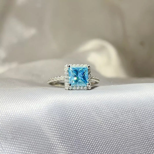 Ocean Mirage | 2 Carat Sea Blue Princess Cut Moissanite Ring | 925 Sterling Silver - Bling Addict