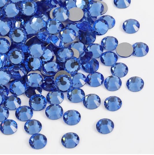 Lt. Sapphire Blue Glass Rhinestones | Blue Glass Flatback Rhinestones | SS3 SS4 SS6 SS8 SS10 SS12 SS16 SS20 SS30 SS34 SS40 | 144–1,440 Pieces